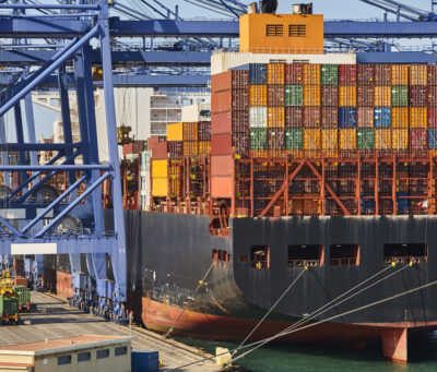 Containers on a vessel. Global market. Cargo shipping. Logistic Containers on a vessel. Global market. Cargo shipping. International economy