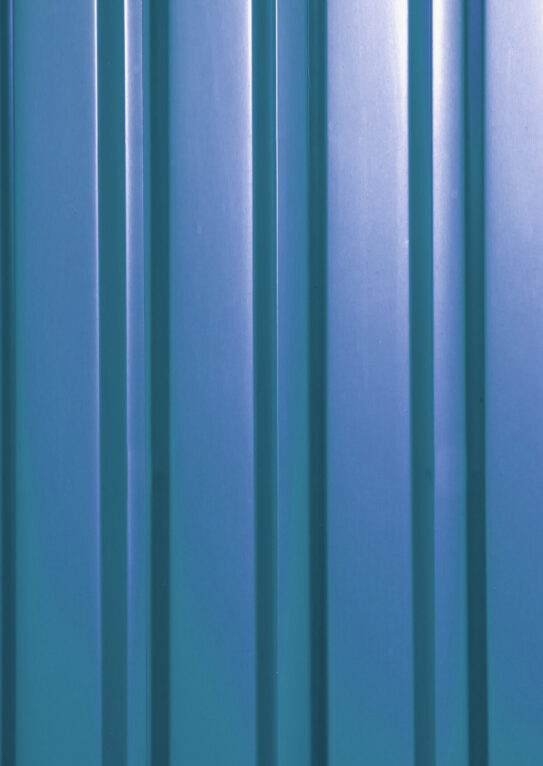 Red sheet metal profile, background. Outdoors of day. Front view. Outdoors of day. Front view.